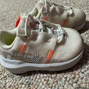 Nike Kids Cream Sneakers with Neon Orange Accents